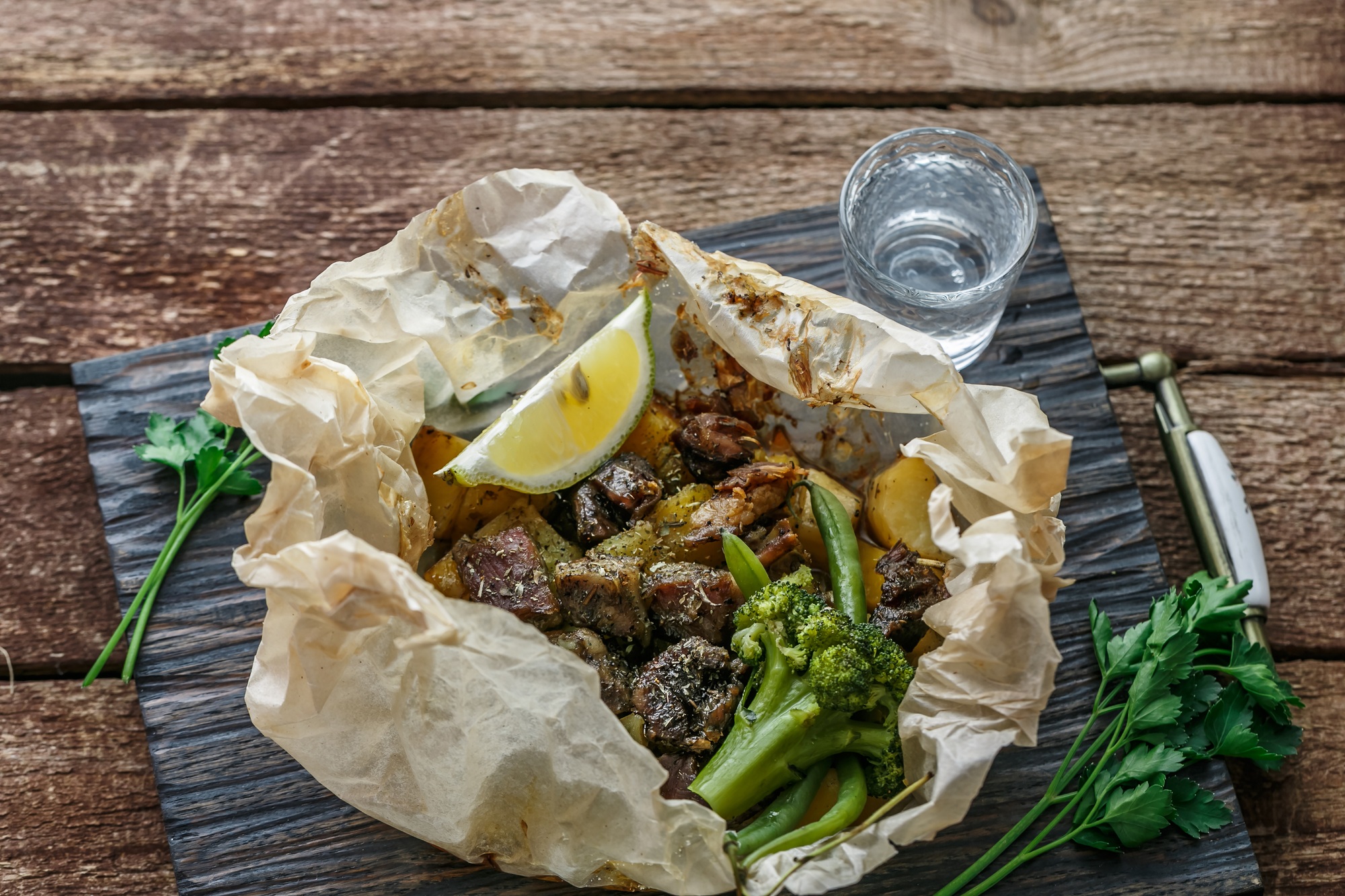 Close view of kleftiko - lamb baked in perchament, greek dish